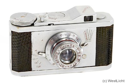 C.O.M.I: Luxia (chrome, black) camera